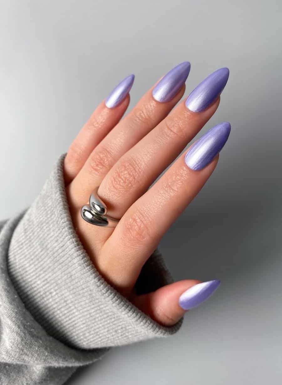 Long almond nails with a light purple chrome