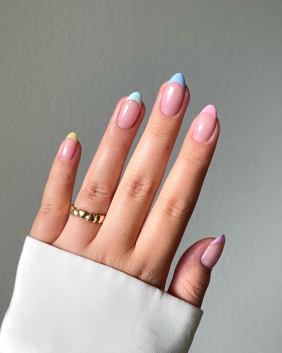 Short nude almond nails with gradient pastel tips