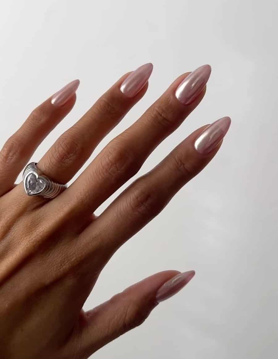 Long pastel pink chrome almond nails