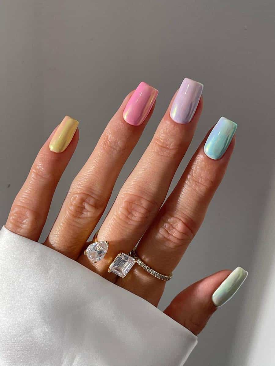 Medium square nails with pastel gradient polish and a chrome finish