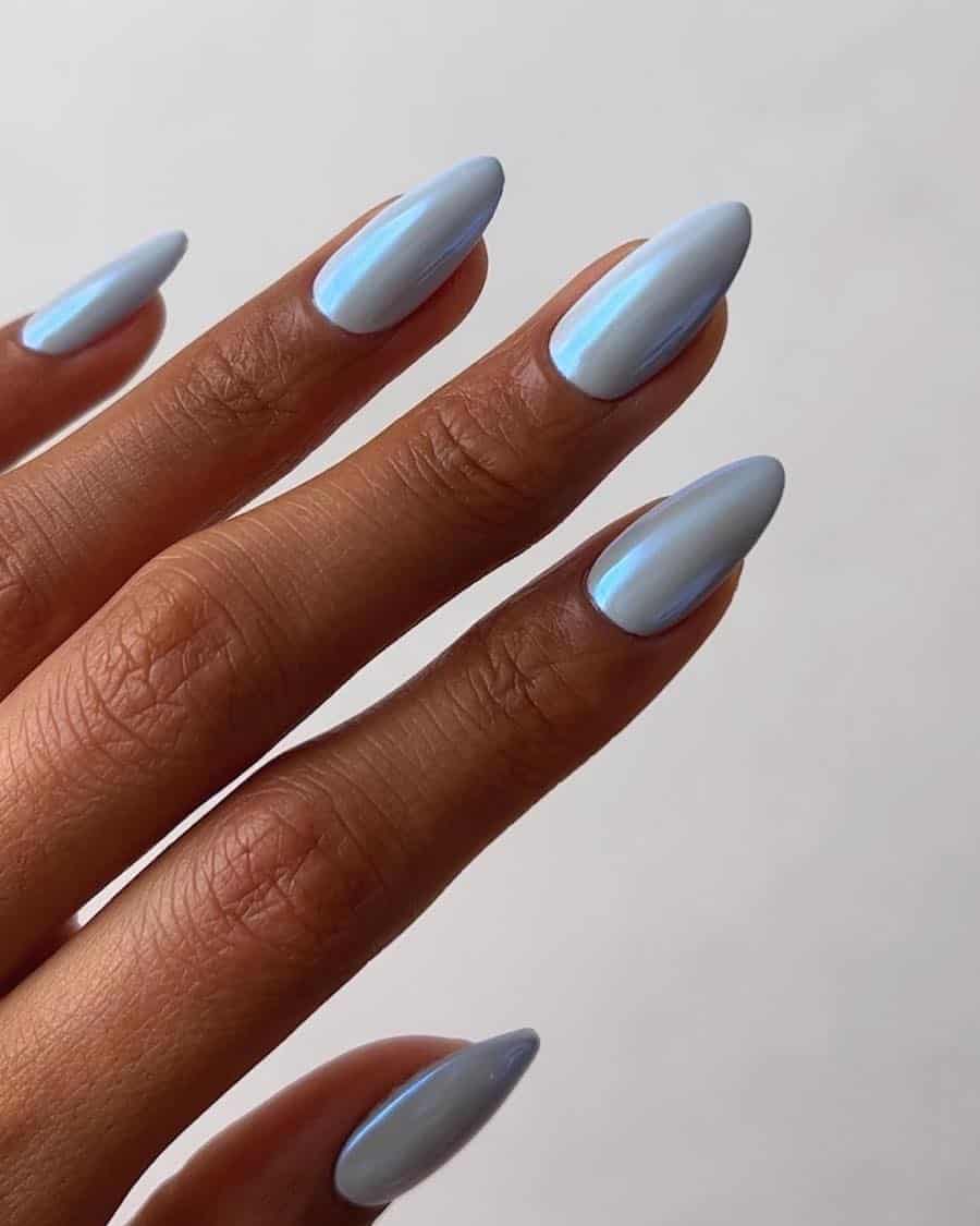 Long almond nails with a pastel blue chrome