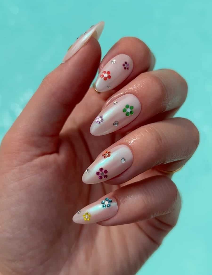 Medium white chrome almond nails with gem flower stickers