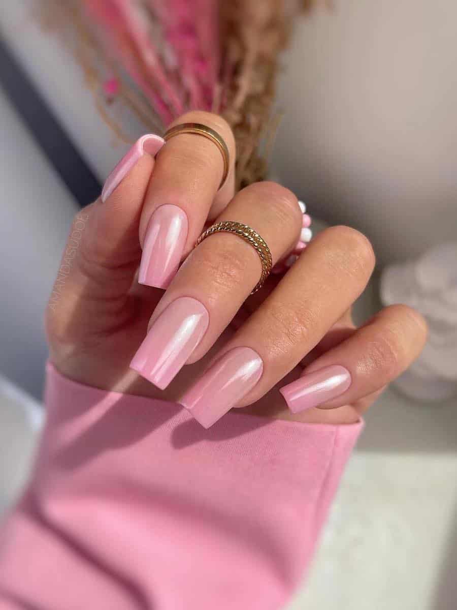 Long square nails with a nude to pink chrome ombre