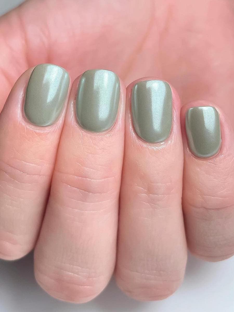 Short chrome pastel green nails