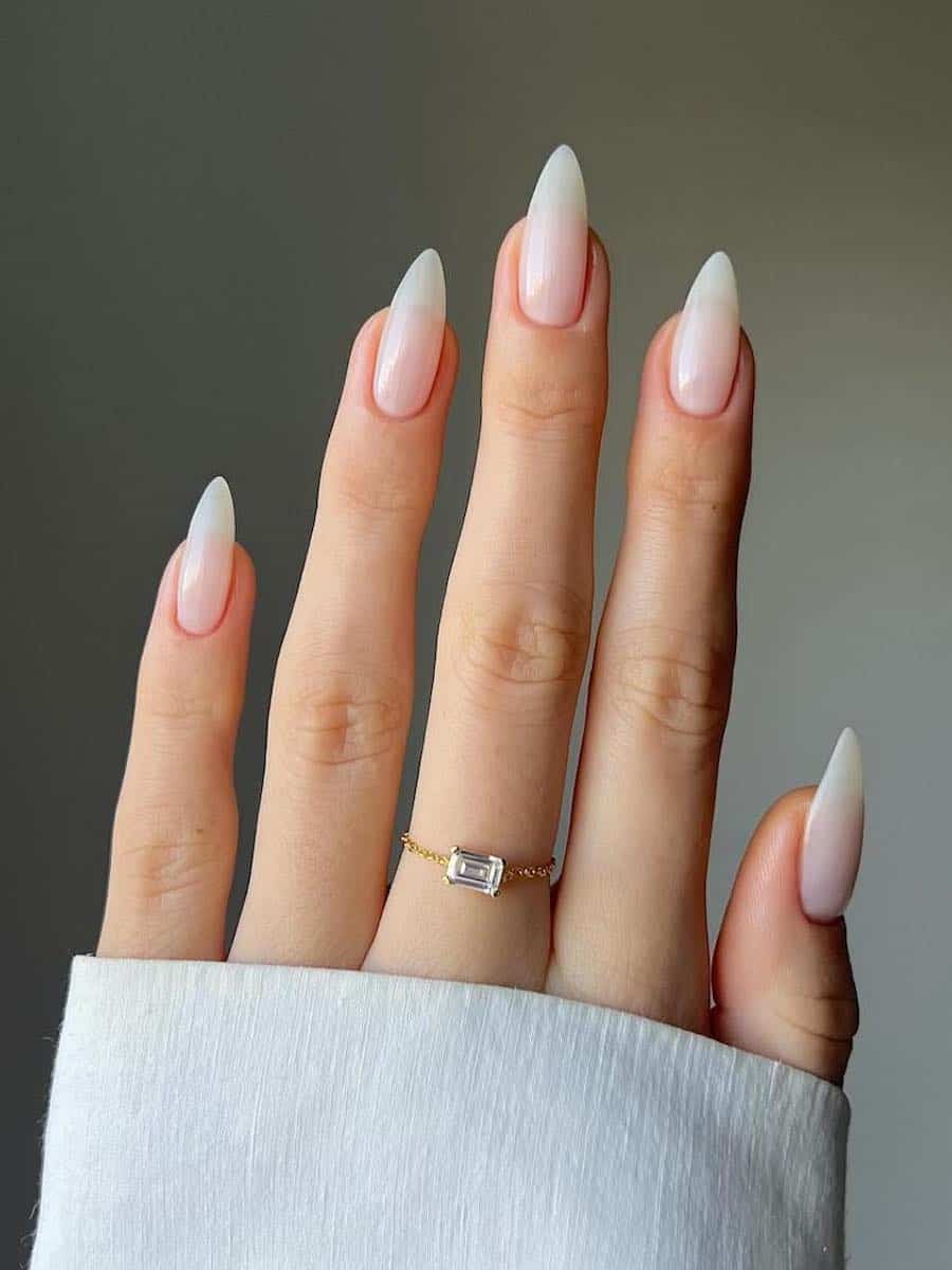 Long milky nude almond nails