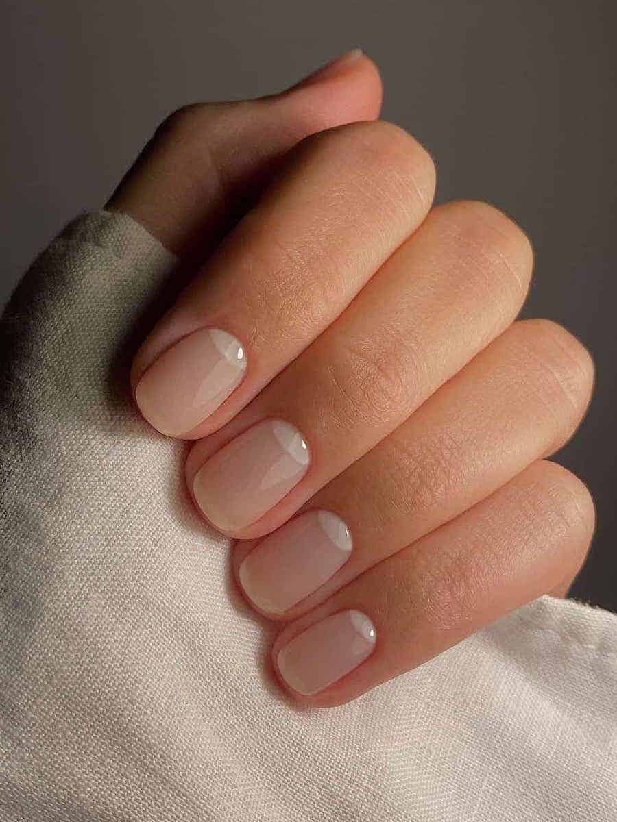 Short squoval glossy nude nails