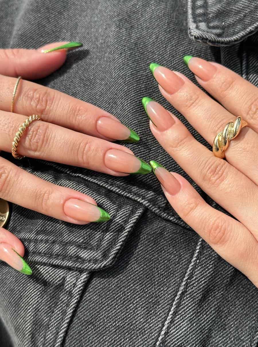 Long nude almond nails with green chrome French tips
