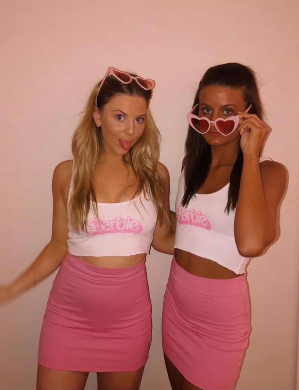 Two women dressed up as Barbie on Halloween.