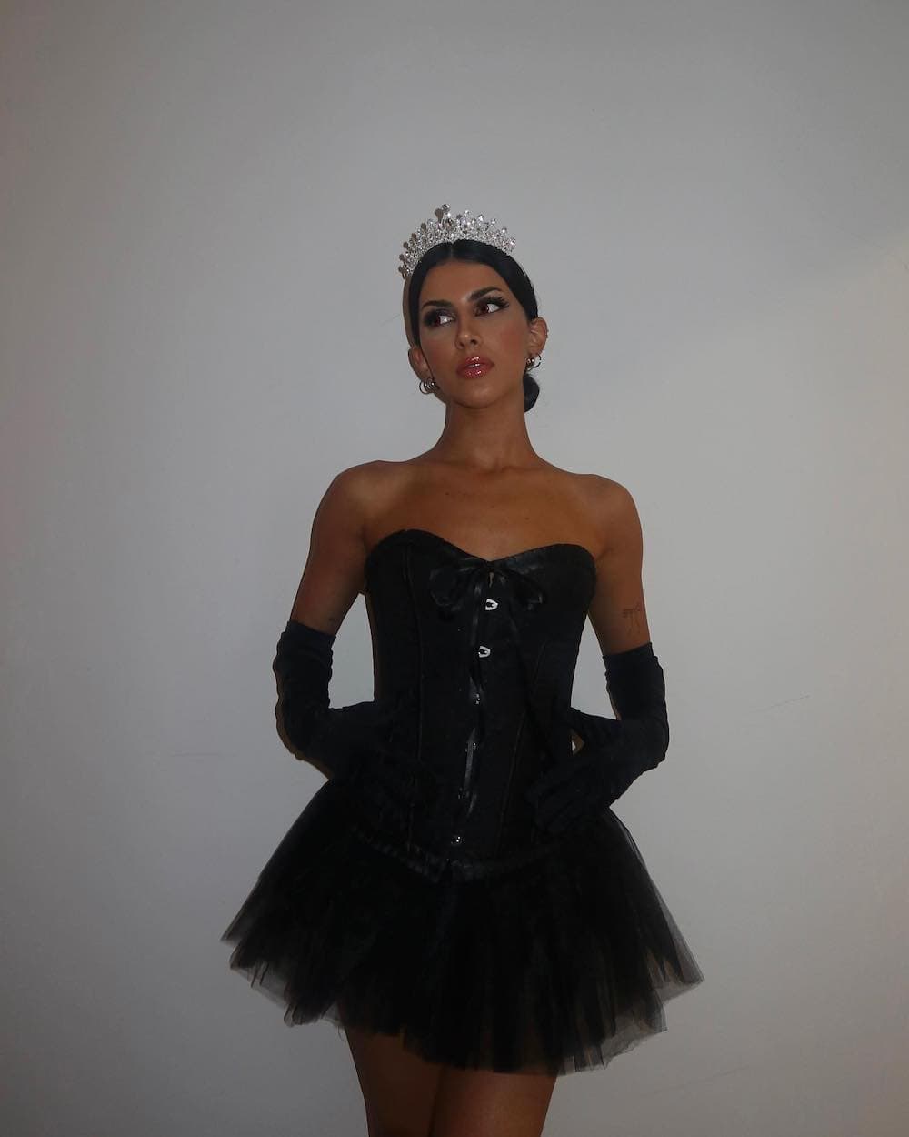 a woman dressed as a black swan