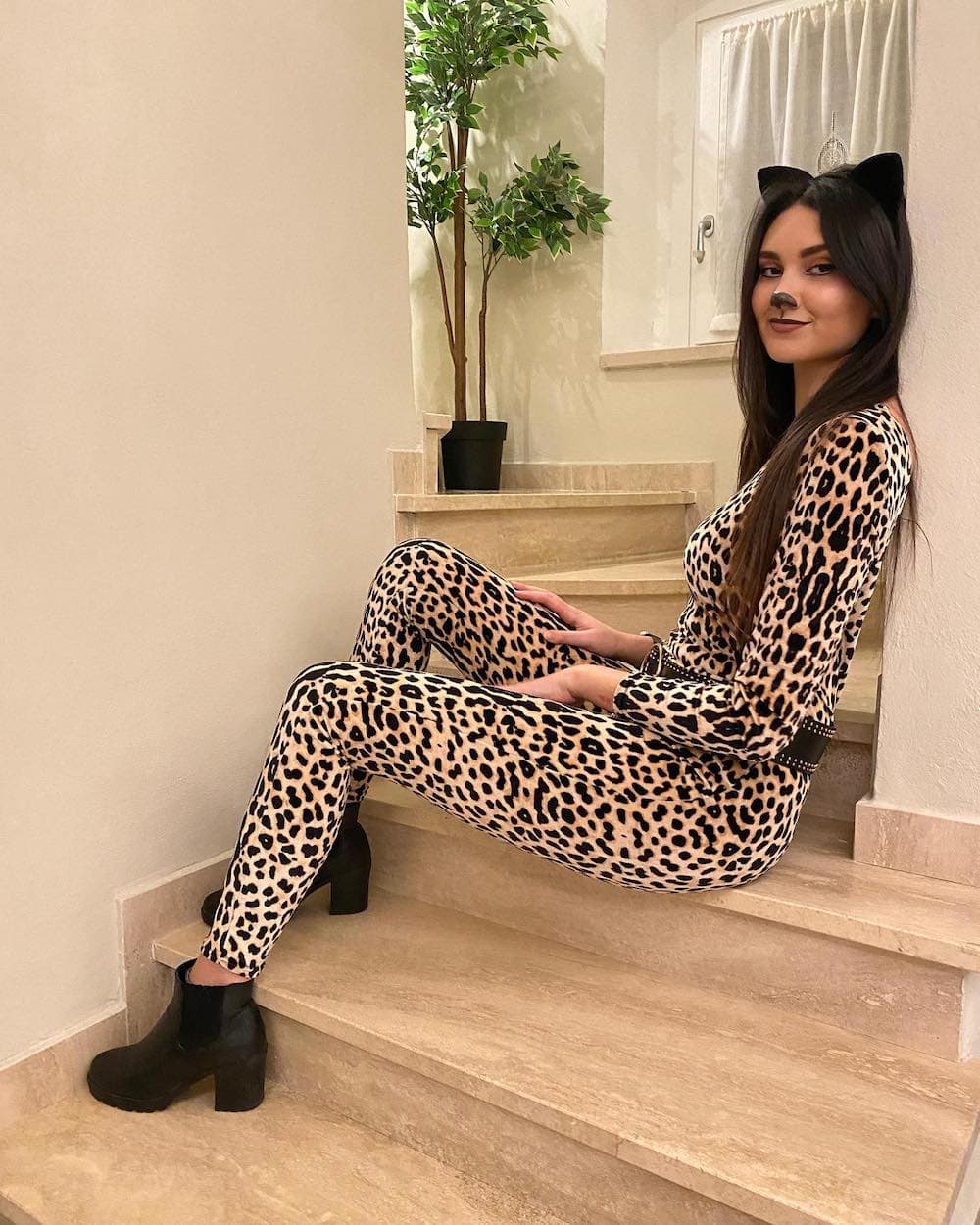 a woman dressed as a cheetah
