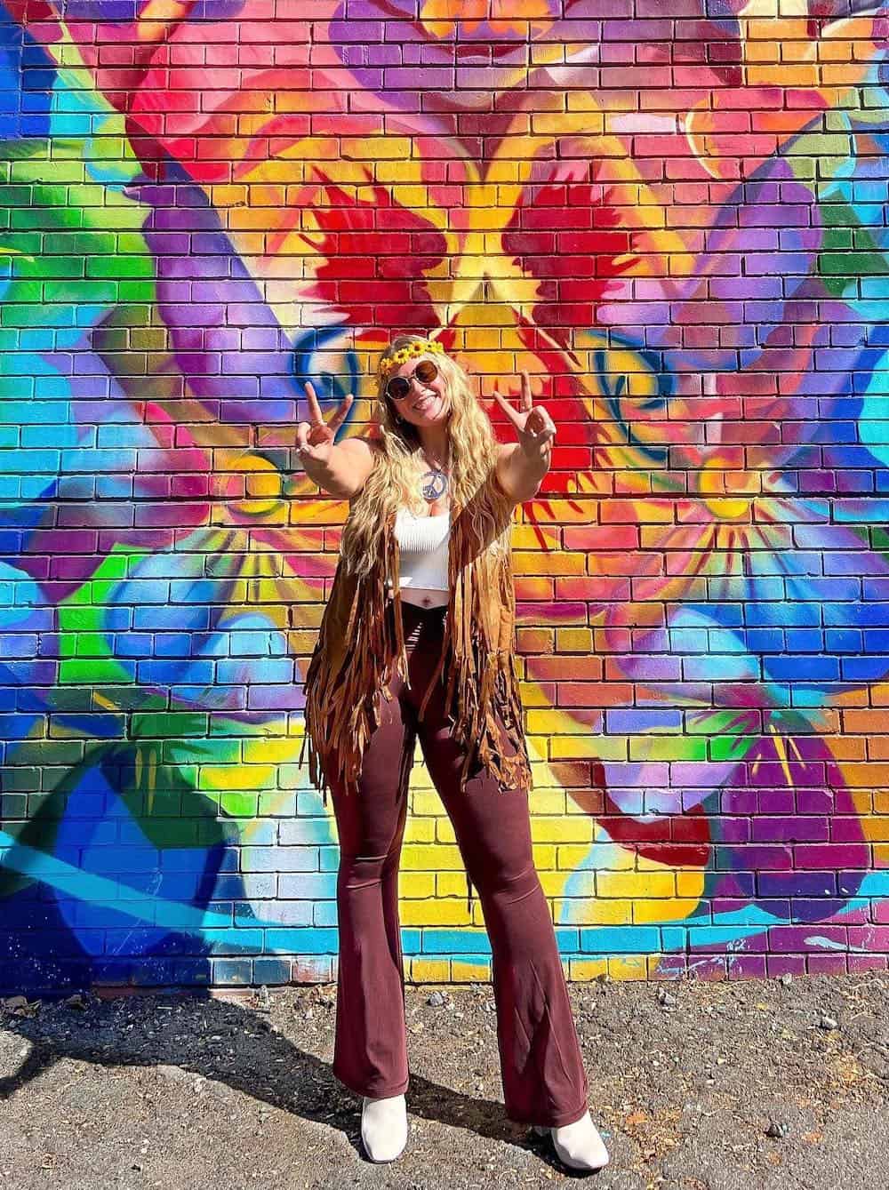 a woman dressed as a hippie