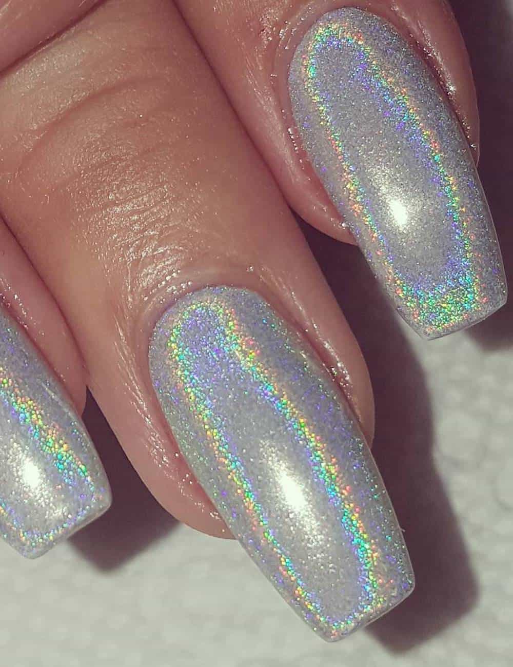 long coffin nails with shimmering iridescent nail polish