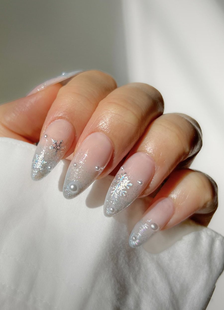 silver glitter ombre nails with pearls and snowflakes