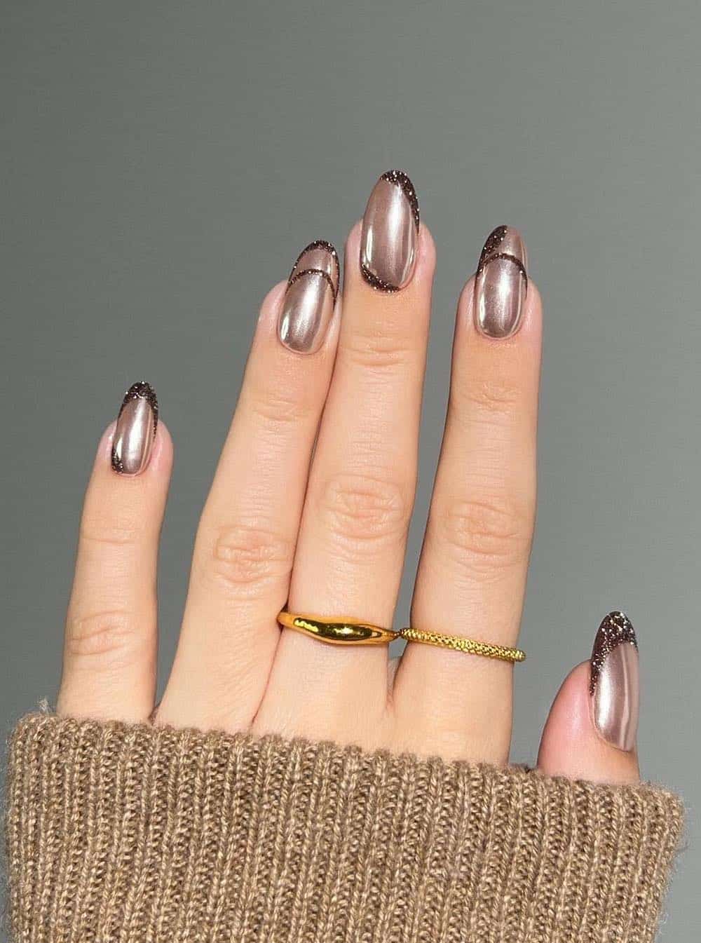 round chrome brown nails with glittering dark brown tip accents