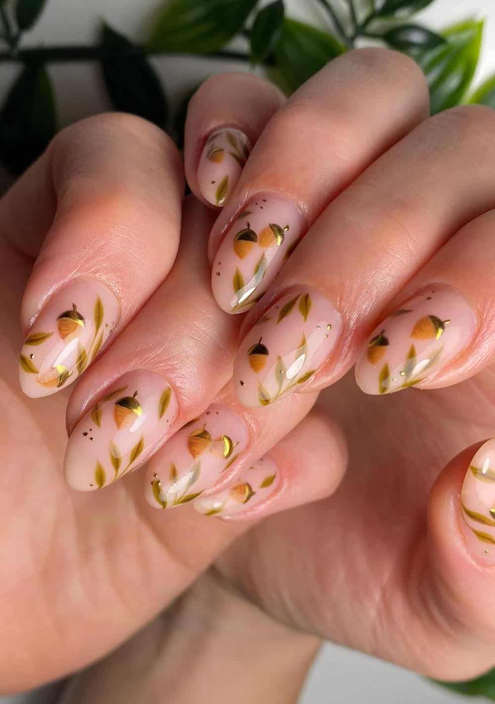 short nude nails with acorn and leaf nail art