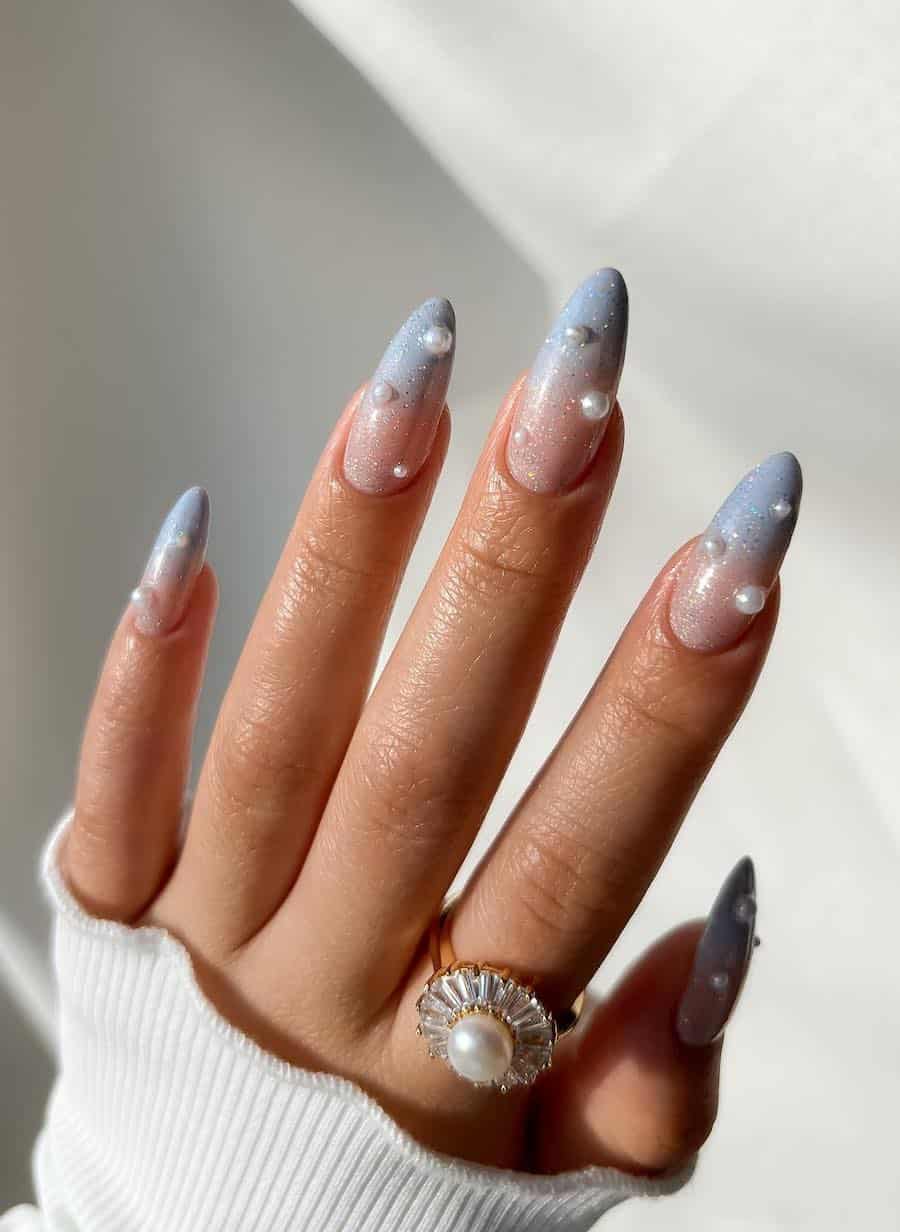 pastel blue and silver glitter ombre nails with pearls