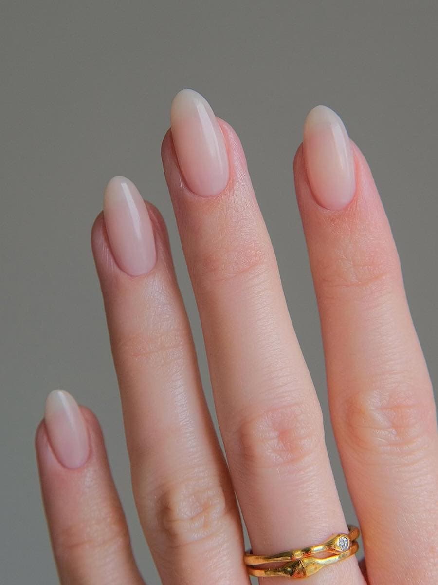 short glossy nude almond nails