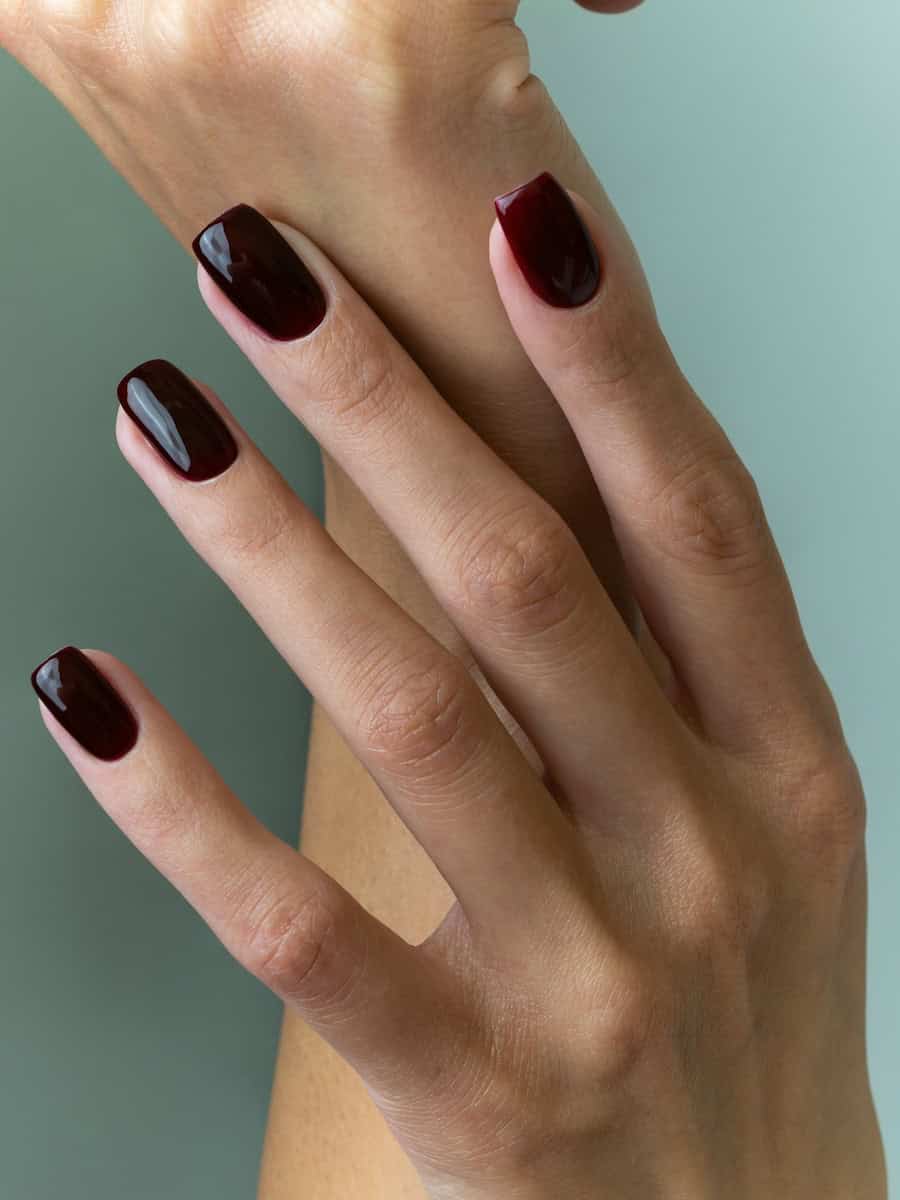 short square nails with black cherry nail polish