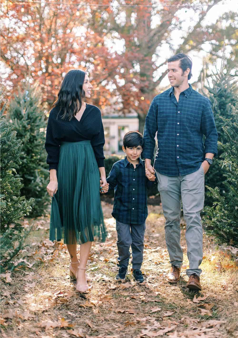 winter family photos featuring blue, black, and green tones