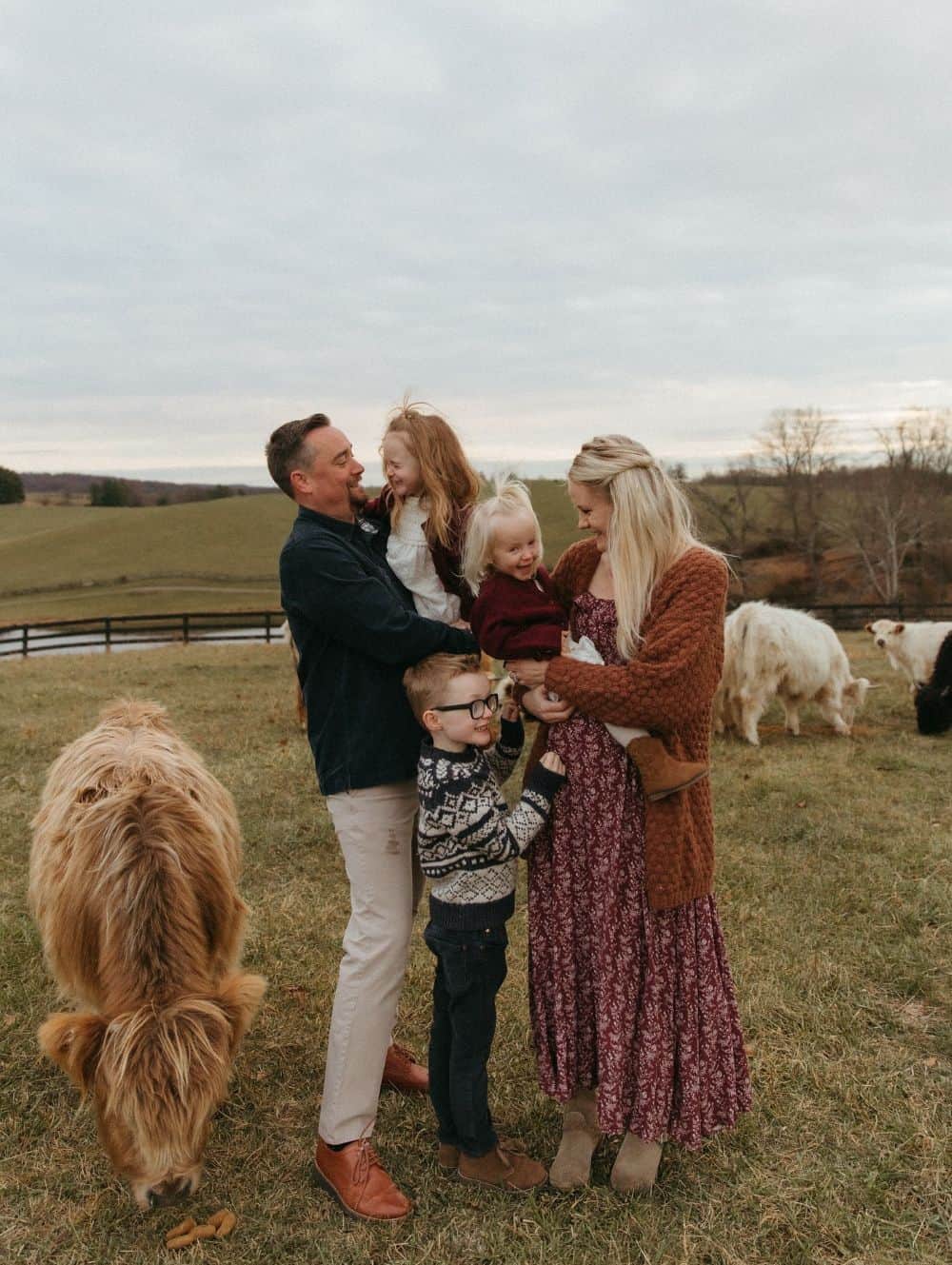 winter family photos featuring dark tones, comfy winter clothes, and prints