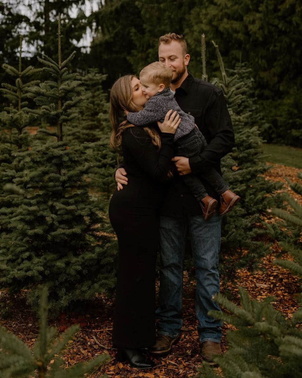 winter family photos featuring black, grey, and denim pieces