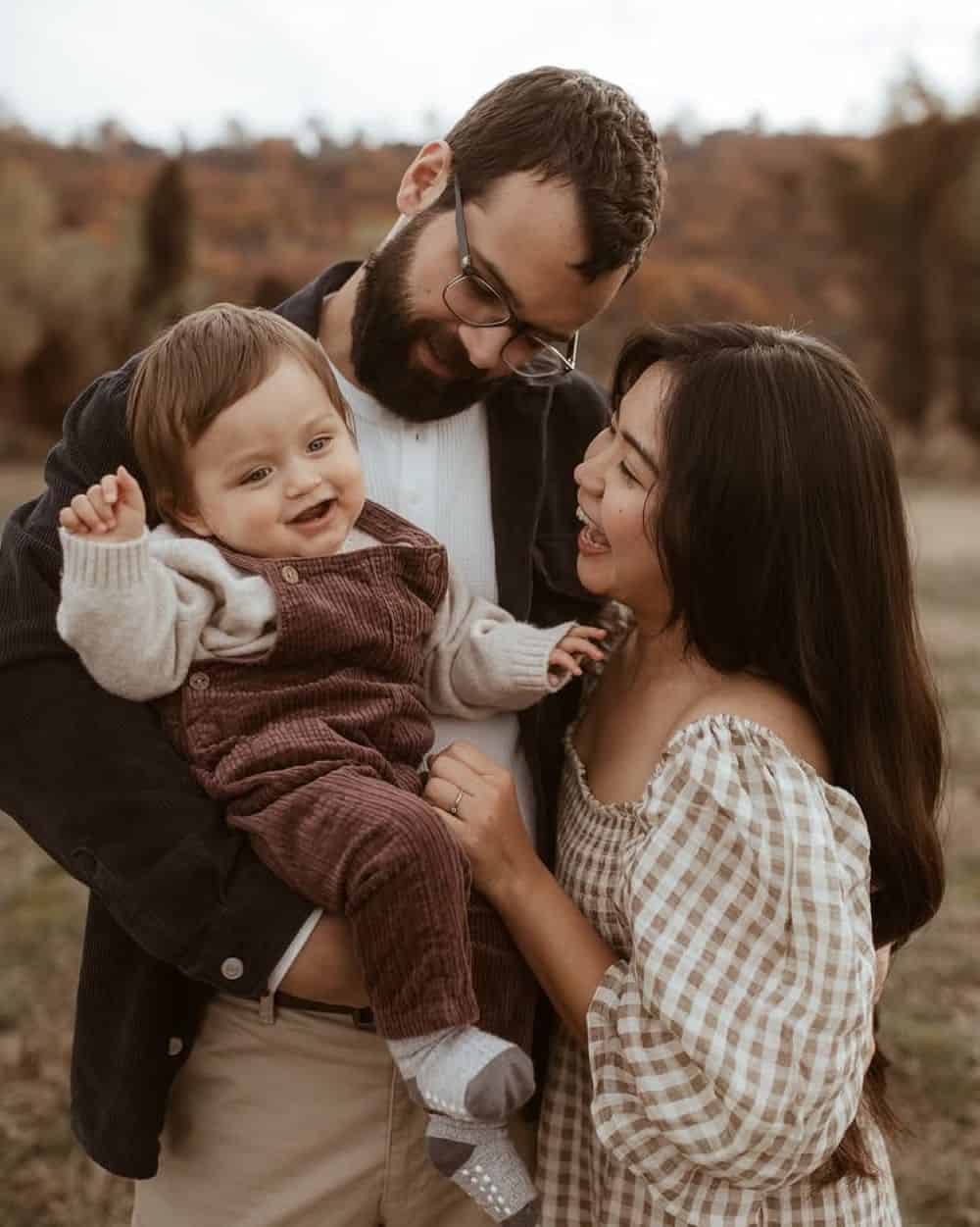 winter family photos featuring gingham dresses, overalls, and classic neutrals