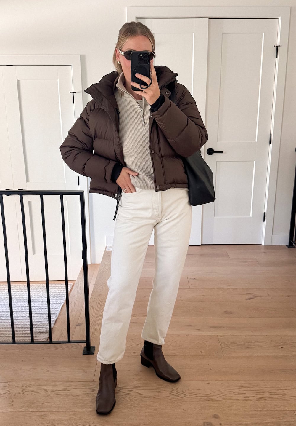 winter boots outfit with light tones and puffer jacket
