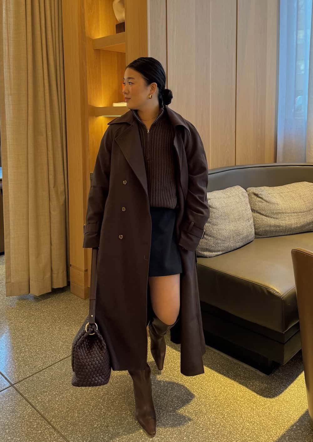 winter boots outfit with a mini skirt and long coat