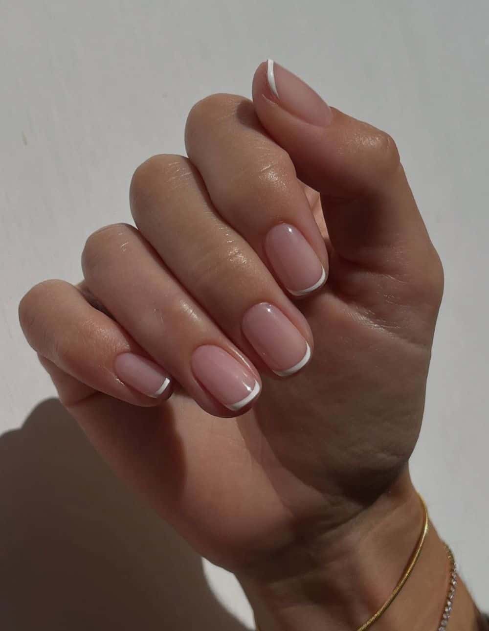 short nails with thin french tips